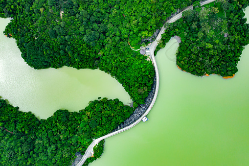 Aerial view of bridge on dam in Kowloon Reservoir, Kam Shan Country Park, Hong Kong