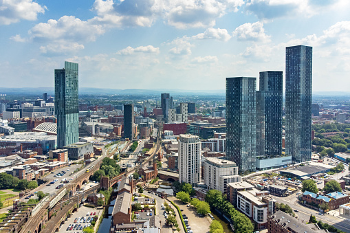 Wide angle aerial view of the skyline of Manchester, England, UK