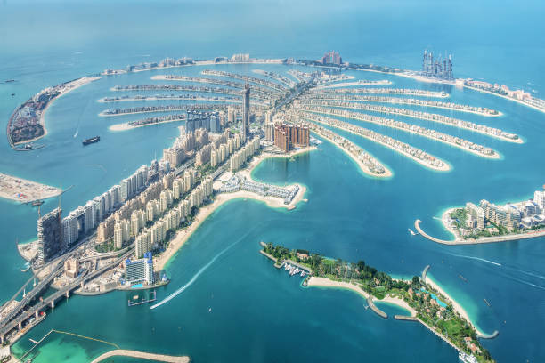 Aerial view of Dubai Palm Jumeirah island, United Arab Emirates Aerial view of Dubai Palm Jumeirah island, United Arab Emirates united arab emirates stock pictures, royalty-free photos & images