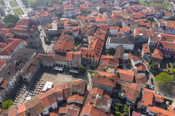 aerial view of famous historical center of guimaraes, portugal. photo made from above by drone. - guimarães imagens e fotografias de stock