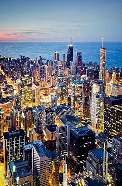 Aerial view of illuminated Chicago cityscape at dusk stock photo