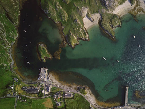 Aerial view of Inishbofin Island, co. Galway, Ireland. Aerial view of the pier at Inishbofin Island, co. Galway, Ireland. wild atlantic way stock pictures, royalty-free photos & images