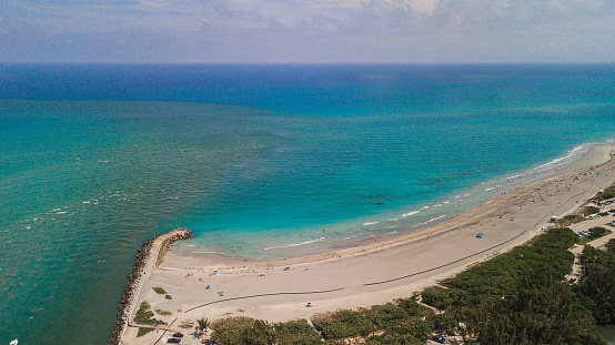 Aerial View of Jupiter Beach, Florida at Mid-Day During Spring Break in March of 2021
