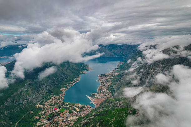 Aerial view of Kotor Bay from above the clouds stock photo
