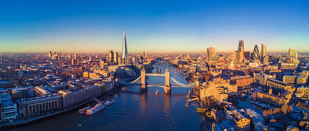 aerial view of london and the river thames - panoramik stok fotoğraflar ve resimler