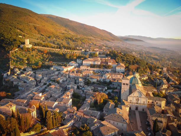 Aerial view of  medieval city of Assisi with Rocca Minor castle in background in Umbria, Italy stock photo