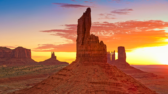 Aerial view of rock formations in Monument Valley at sunrise, Arizona, USA.