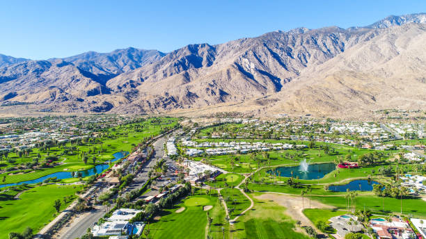 Aerial View of Palm Springs A beautiful aerial of Palm Springs and Palm Desert taking during a gorgeous blue-sky morning with 25+ miles of visibility. palm springs california stock pictures, royalty-free photos & images