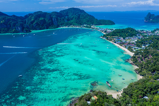 Aerial view of Phi Phi, Maya beach with blue turquoise seawater, in Phi, Yasothon, Thailand