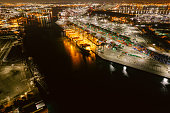 istock Aerial view of Port of Los Angeles with cranes, gantries, and shipping containers 1325473810