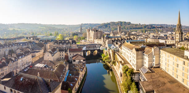 Aerial view of Pulteney bridge in Bath, England Aerial view of Pulteney bridge in Bath, England somerset england stock pictures, royalty-free photos & images
