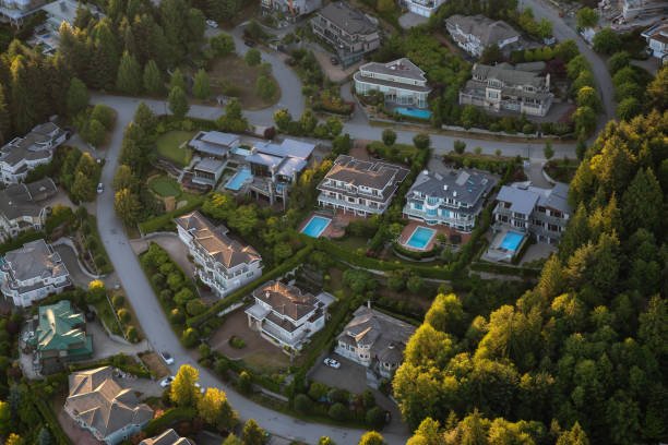 Aerial view of residential homes Aerial view of the big luxury homes on the hill during a vibrant sunny summer day. Taken in West Vancouver, British Columbia, Canada. west vancouver stock pictures, royalty-free photos & images