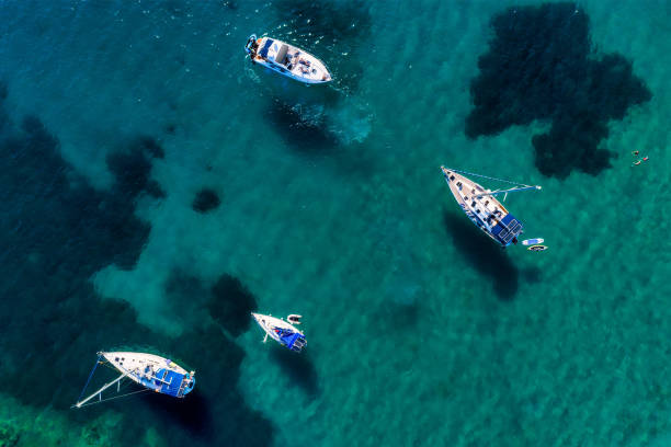 Aerial view of sail boats in front of Aliki beach at Thassos island, Greece stock photo