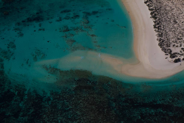 Aerial view of sandspit and sand movements around coral reef at the Ningaloo Marine Park stock photo