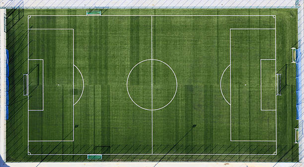 Aerial view of sports field with white markings stock photo