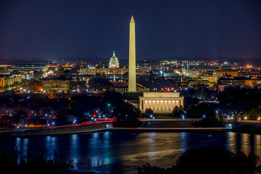 Long Exposure picture of illuminated Washington DC at night with the US. Capitol, Washington Monument and the Lincoln Memorial visible