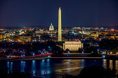 istock Aerial View of the Washington DC at night 1289724591