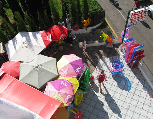 aerial view of umbrellas boy - bayern stok fotoğraflar ve resimler