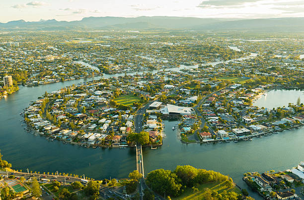 Aerial view of waterfront houses during sunset stock photo