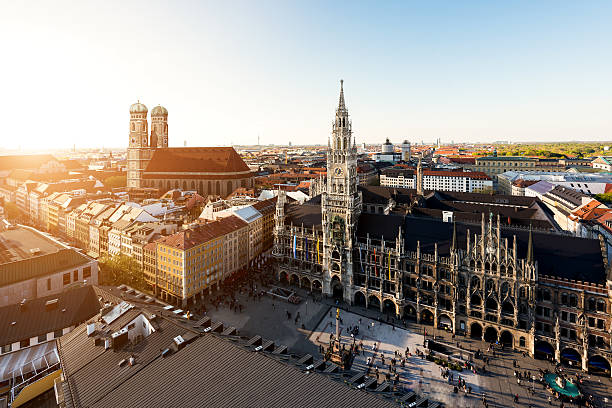Aerial view on Munich old town hall in Munich, Germany Aerial view on Munich old town hall or Marienplatz town hall and Frauenkirche in Munich, Germany munich stock pictures, royalty-free photos & images