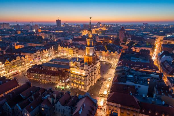 Aerial view on Poznan main square and old city at evening. Aerial view on Poznan main square and old city at evening. Poznan, Wielkopolska, Poland poznan stock pictures, royalty-free photos & images