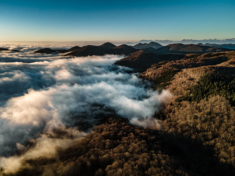 Aerial View on Rolling Landscape With Hills and Fog.