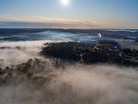 Aerial view over a foggy rural landscape