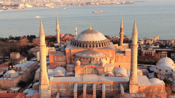 Aerial view over Hagia Sophia with glittering mosaics of Biblical scenes in vast, domed former Byzantine church and mosque - Istanbul, Turkey stock photo