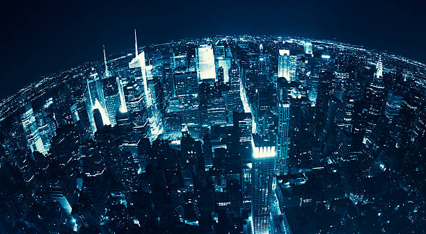 Aerial View over Manhattan Skyline in the night - NYC Aerial View over Manhattan Skyline in the night fish eye lens stock pictures, royalty-free photos & images