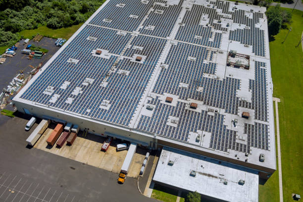 aerial view rooftop on the solar panel energy for generating electricity with of building warehouse an industrial zone - zonnepanelen warehouse stockfoto's en -beelden