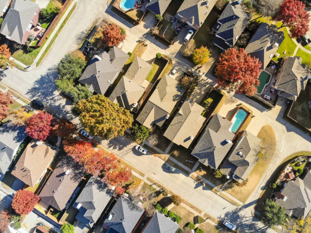 Aerial view urban subdivision houses with pool and autumn leaves near Dallas stock photo