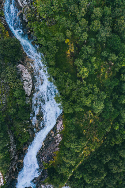 Aerial view waterfall Ovstebrufossen landscape in Norway mountains travel drone scenery wilderness nature stock photo