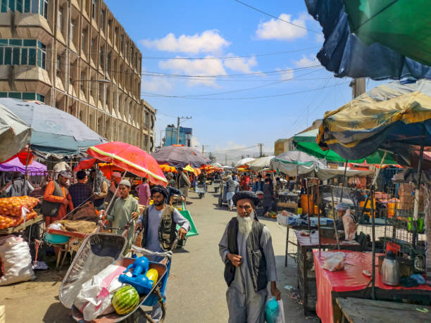 Afghanistan Mazar-i-Sharif - Afghanistan - June 28, 2021: Afghan peoples are shopping and walking Old city bazaar of Kabul, Afghanistan.It is a city on the border of Uzbekistan. central asia stock pictures, royalty-free photos & images