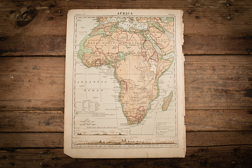 Color stock photo of an antique Africa map illustration page on an old, wooden trunk. Salvaged from an 1871 geography book.