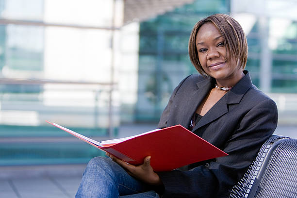 African american business woman with folder stock photo