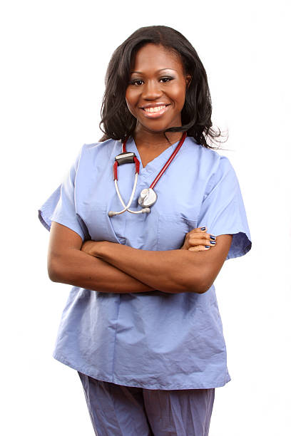 African American Female Nurse arms folded stock photo