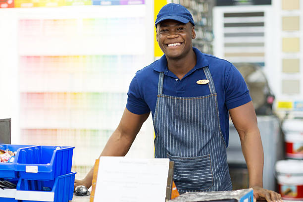 african american hardware store worker stock photo