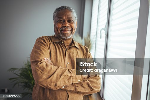istock African American Senior Man at home Portrait. 1385099292