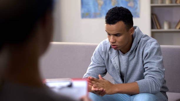 African american teenager suffering from loneliness and bullying, discrimination  psychotherapy stock pictures, royalty-free photos & images