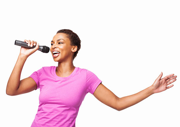 African American Woman Singing On a Mike - Isolated stock photo