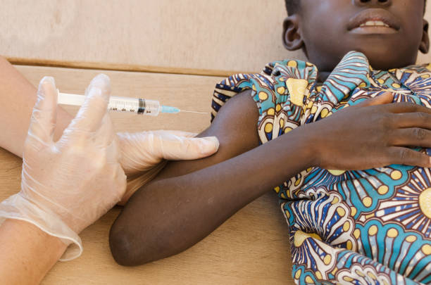 African boy ready to get his vaccination in Bamako, Mali stock photo