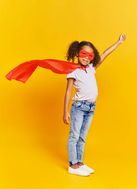 African girl in superhero costume African girl in superhero costume stage costume stock pictures, royalty-free photos & images