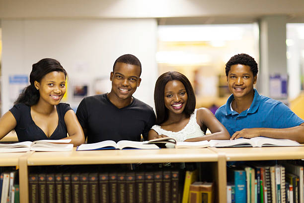 african university students in library stock photo