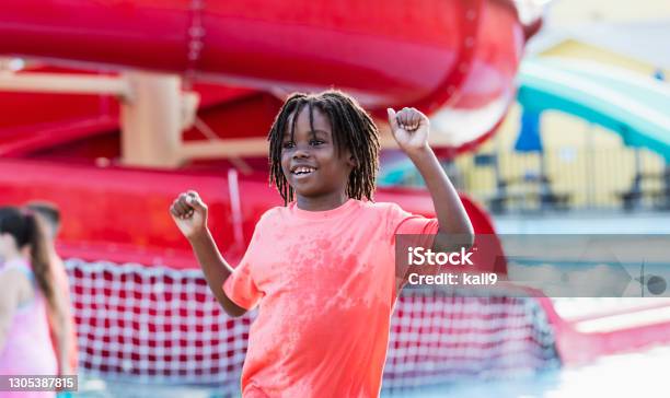African-American boy at water park