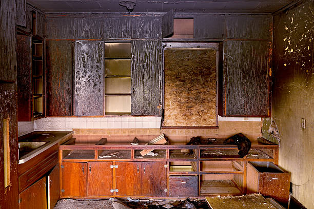 Aftermath: Charred Remains of Kitchen Destroyed by Fire stock photo