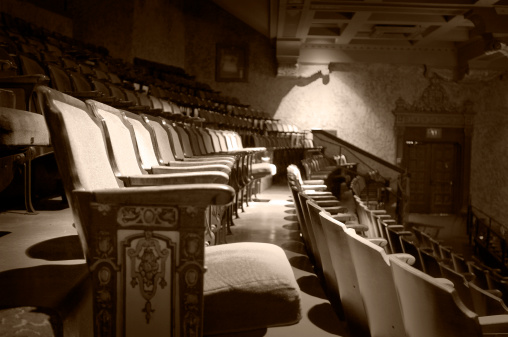 aged and colorized theater seats...some visible noise.