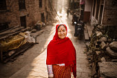 istock Aged women standing at street with winter cloth 923799698