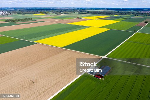 istock Agricultural Landscape with Farm Barn, Aerial View 1284361124
