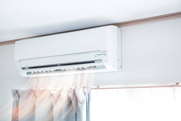 Air conditioner blowing warm air Air conditioner blowing warm air small stock pictures, royalty-free photos & images