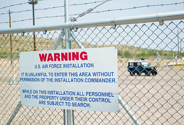 Air Force Installation U.S. Air Force installation sign on chain link fence. military base stock pictures, royalty-free photos & images